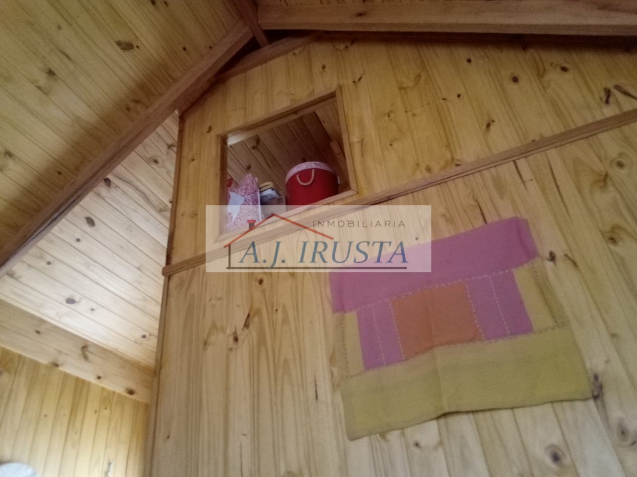 TERRENO CON CABAÑA DE MADERA