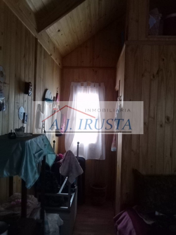 TERRENO CON CABAÑA DE MADERA